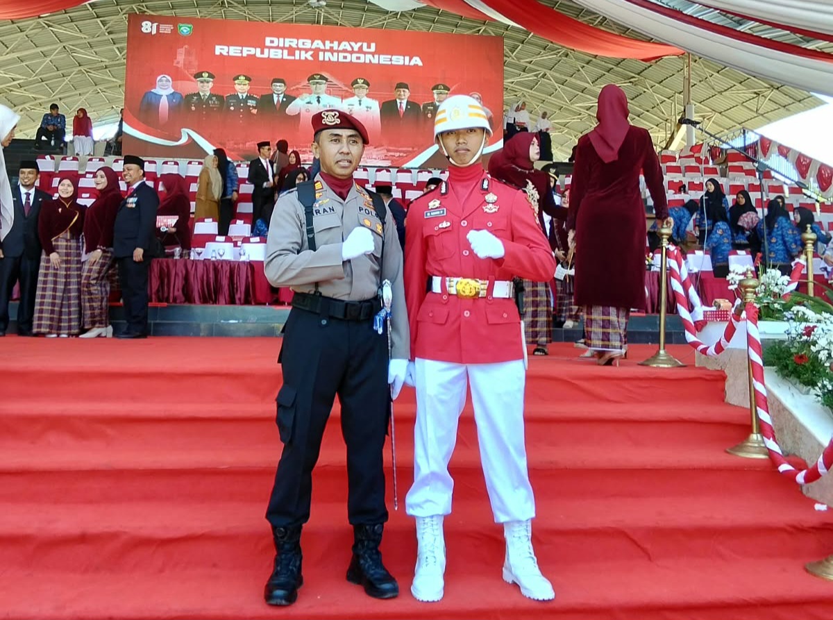 Empat Kali Pimpin Upacara HUT RI, AKP Imran, S.H. Tampilkan Dedikasi—Jejaknya Diikuti putranya Bripda muh. Raihan Prayuda