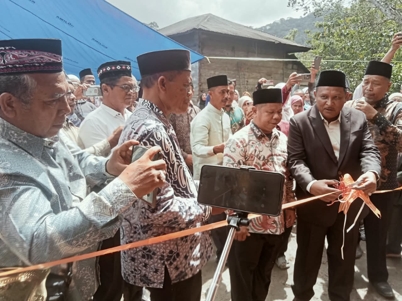 PERESMIAN SOPIGODANG PARSADAAN DIREGARSUAGIAN BERLANGSUNG ANAN DAN TERTIP.